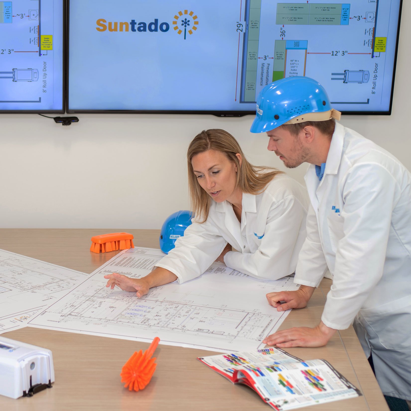 Going over plans for Suntado plant Nelson-Jameson